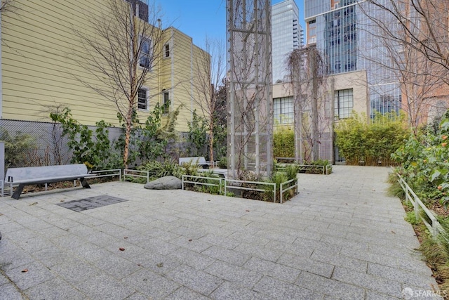 view of property's community featuring a patio