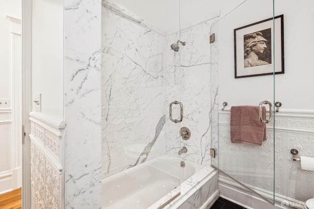 bathroom featuring enclosed tub / shower combo