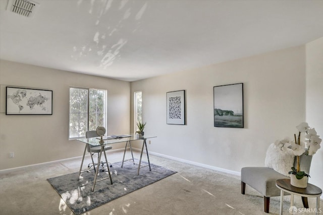 home office featuring carpet, baseboards, and visible vents