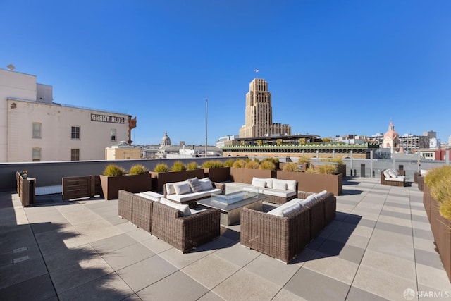 view of patio featuring a city view and an outdoor hangout area