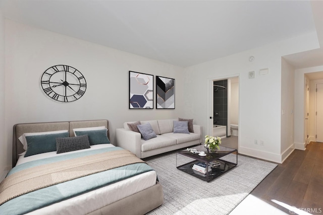 living room with baseboards and wood finished floors