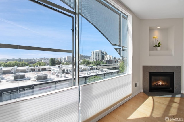 1600 Webster St Unit 409, San Francisco, CA 94115 - interior space featuring light wood-style flooring, a wealth of natural light, baseboards, and a view of city