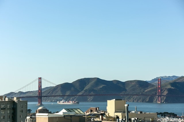 view of mountain feature featuring a water view