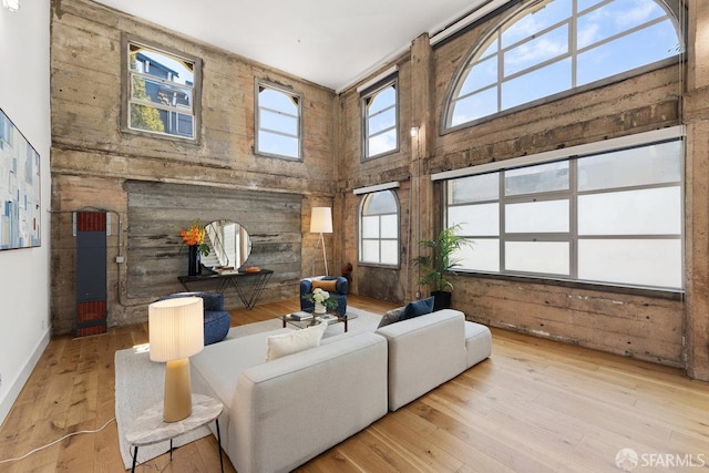1 Rausch St Unit A, San Francisco, CA 94103 - living room featuring a towering ceiling and wood-type flooring