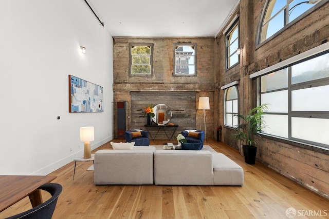 1 Rausch St Unit A, San Francisco, CA 94103 - living area with wood-type flooring and a towering ceiling