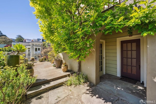 4020 20th St, San Francisco, CA 94114 - view of exterior entry featuring a wooden deck and stucco siding