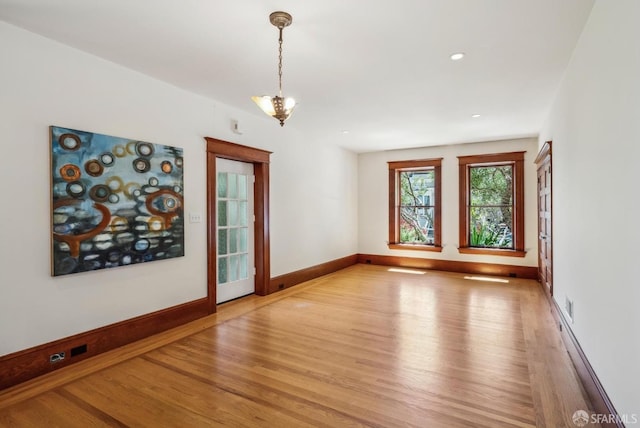 4020 20th St, San Francisco, CA 94114 - spare room with light wood-style floors, baseboards, recessed lighting, and a chandelier