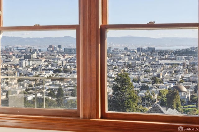 room details with a mountain view and a view of city