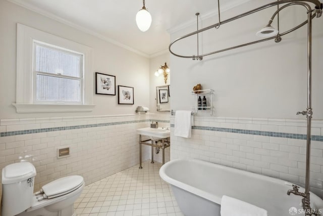 4020 20th St, San Francisco, CA 94114 - full bath with tile walls, a freestanding bath, toilet, a wainscoted wall, and tile patterned flooring