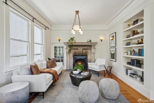 4020 20th St, San Francisco, CA 94114 - living area featuring built in features, wood finished floors, ornamental molding, baseboards, and a fireplace