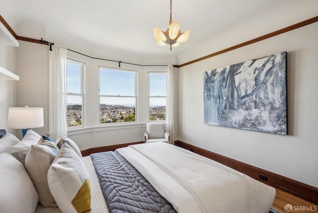 4020 20th St, San Francisco, CA 94114 - bedroom with baseboards and a chandelier