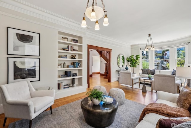 4020 20th St, San Francisco, CA 94114 - living area featuring a chandelier, crown molding, built in features, and wood finished floors
