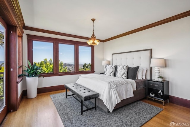 4020 20th St, San Francisco, CA 94114 - bedroom with multiple windows, ornamental molding, baseboards, and a chandelier