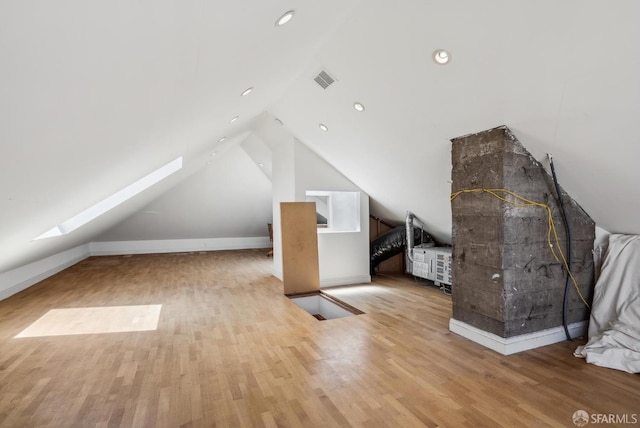 4020 20th St, San Francisco, CA 94114 - bonus room featuring a skylight, lofted ceiling, wood finished floors, and recessed lighting