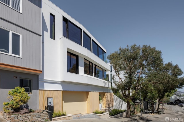 view of building exterior with a garage