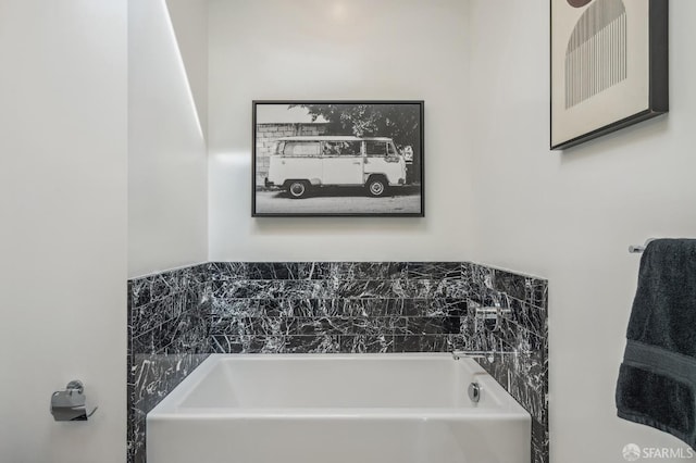 bathroom featuring a tub