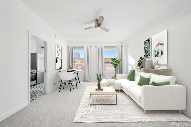 carpeted living room featuring ceiling fan