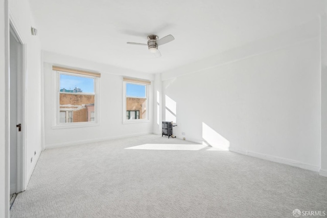 interior space featuring ceiling fan