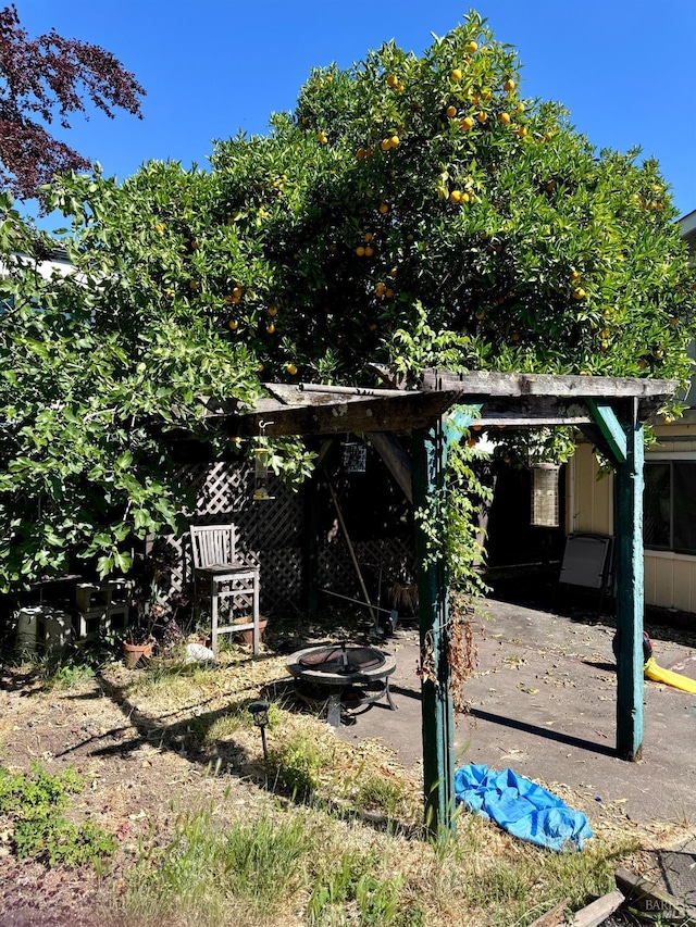 exterior space featuring a fire pit