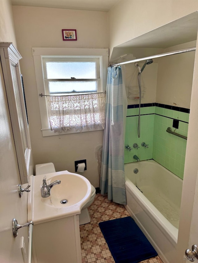 full bathroom with toilet, vanity, and shower / bathtub combination with curtain