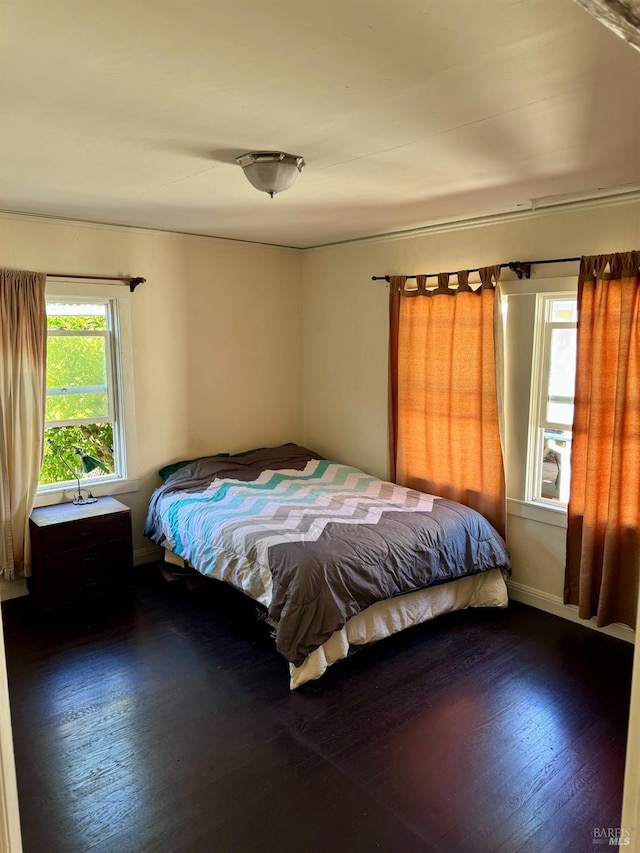 bedroom featuring hardwood / wood-style flooring