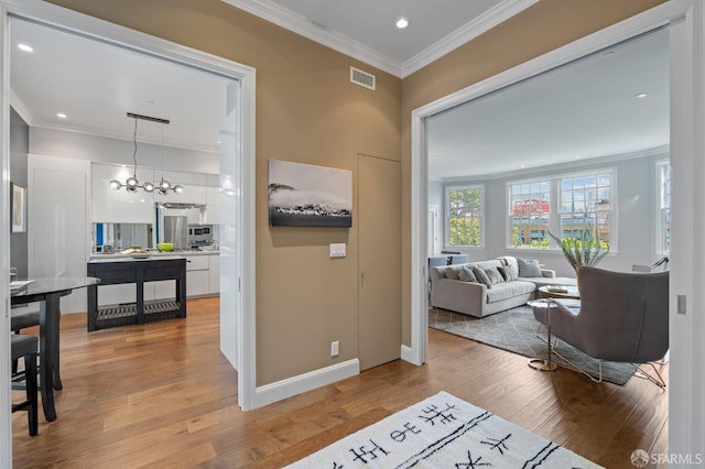 116 Alta St, San Francisco, CA 94133 - hall featuring crown molding, wood finished floors, and recessed lighting