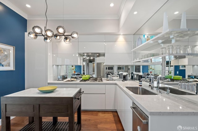 116 Alta St, San Francisco, CA 94133 - kitchen with modern cabinets, dishwasher, white cabinetry, crown molding, and wood finished floors