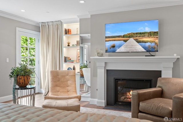 116 Alta St, San Francisco, CA 94133 - living room with wood finished floors, a glass covered fireplace, crown molding, and recessed lighting