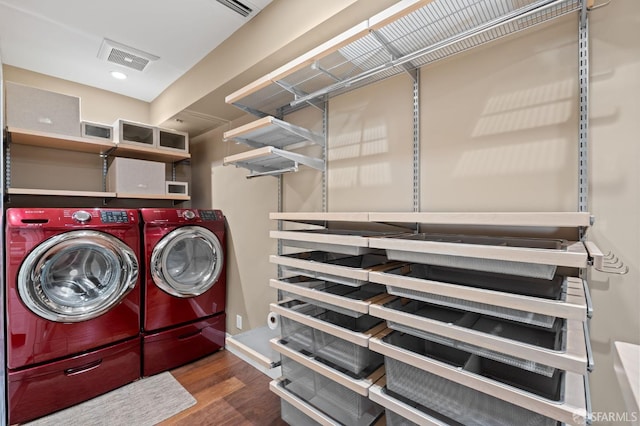 116 Alta St, San Francisco, CA 94133 - laundry area with washing machine and clothes dryer and wood finished floors