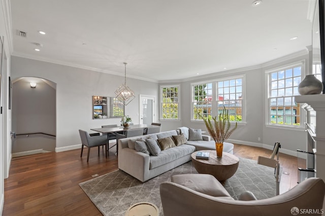 116 Alta St, San Francisco, CA 94133 - living room featuring arched walkways, plenty of natural light, ornamental molding, recessed lighting, and wood finished floors