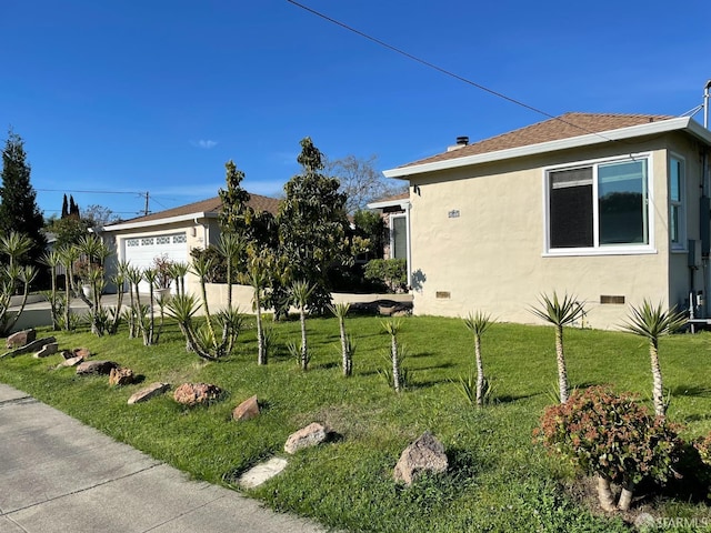 21723 Ada St, Castro Valley, CA 94546 - view of home's exterior featuring a garage, crawl space, a yard, and stucco siding