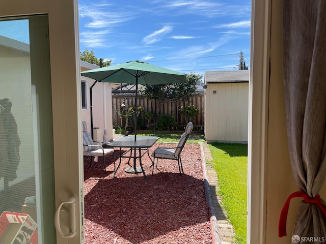 21723 Ada St, Castro Valley, CA 94546 - view of yard featuring outdoor dining space, an outbuilding, a patio, and fence