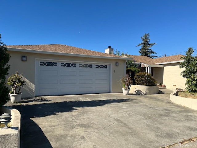 21723 Ada St, Castro Valley, CA 94546 - single story home with an attached garage, driveway, a chimney, and stucco siding