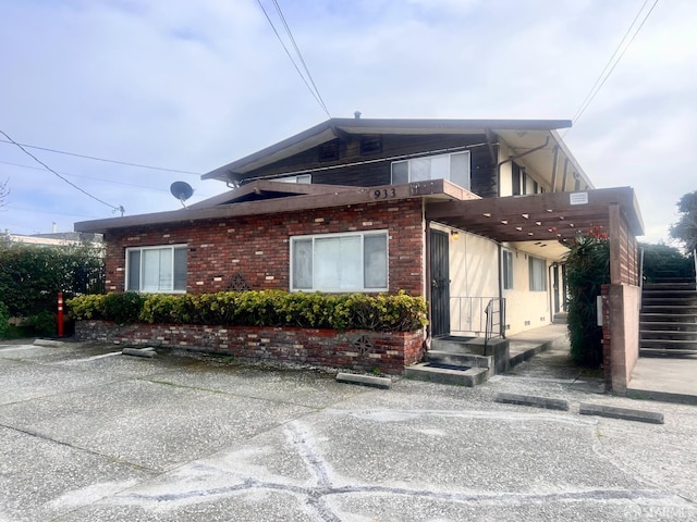 933 41st St, Oakland, CA 94608 - view of side of home featuring brick siding
