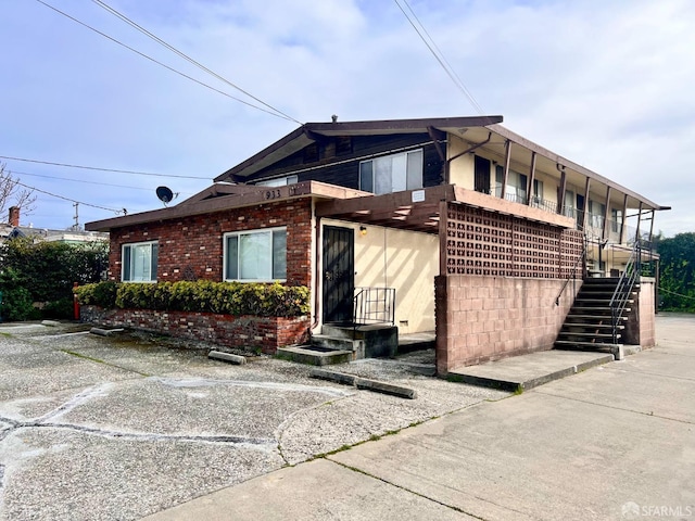 933 41st St, Oakland, CA 94608 - view of front facade with brick siding