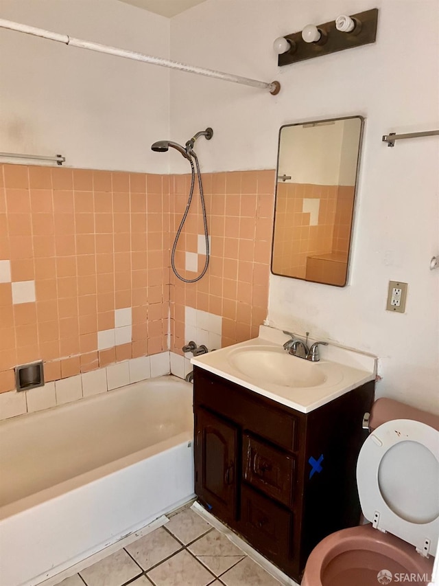 933 41st St, Oakland, CA 94608 - full bathroom featuring tile patterned floors, vanity, toilet, and  shower combination