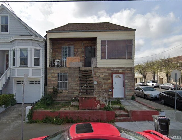 view of front of home with a garage