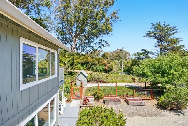 1685 Bay Flat Rd, Bodega Bay, CA 94923 - view of patio featuring a garden
