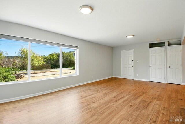 1685 Bay Flat Rd, Bodega Bay, CA 94923 - spare room with light wood-style floors and baseboards