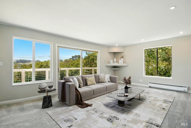 1685 Bay Flat Rd, Bodega Bay, CA 94923 - living room featuring a baseboard heating unit, baseboards, plenty of natural light, carpet flooring, and recessed lighting