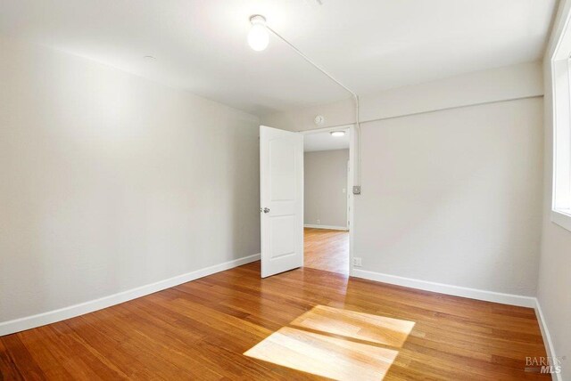 1685 Bay Flat Rd, Bodega Bay, CA 94923 - unfurnished room with light wood-style flooring and baseboards