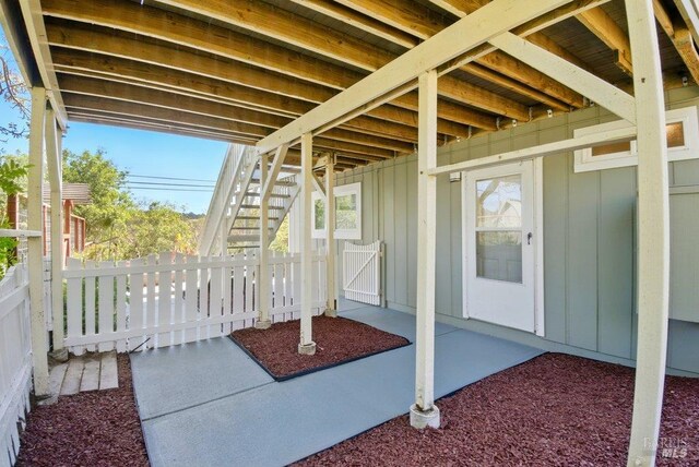 1685 Bay Flat Rd, Bodega Bay, CA 94923 - entrance to property featuring board and batten siding and a patio area