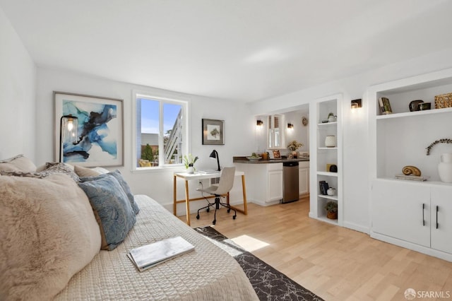 bedroom featuring light wood-style floors