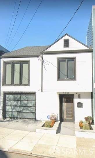 4638 25th St, San Francisco, CA 94114 - view of front of home featuring stucco siding and an attached garage