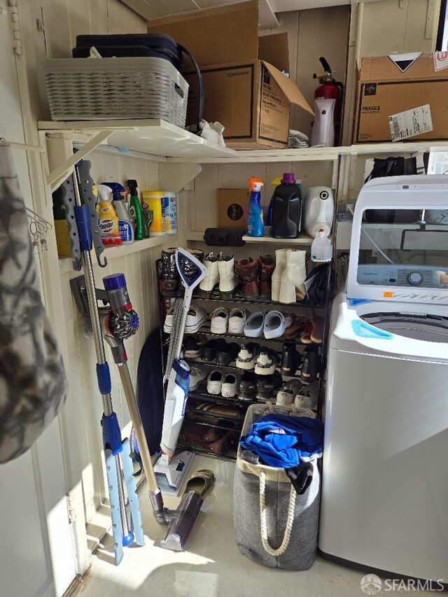 storage area featuring washer / dryer