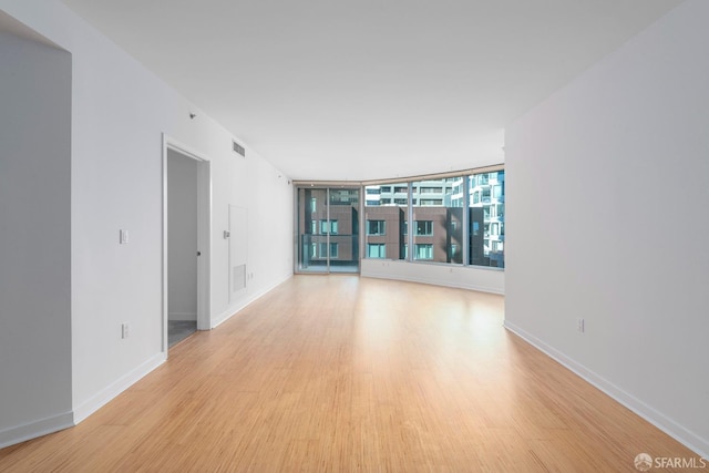 empty room featuring light hardwood / wood-style floors