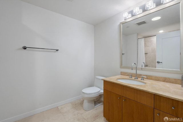 333 1st St Unit N1404, San Francisco, CA 94105 - bathroom featuring toilet, vanity, baseboards, and a shower with shower curtain