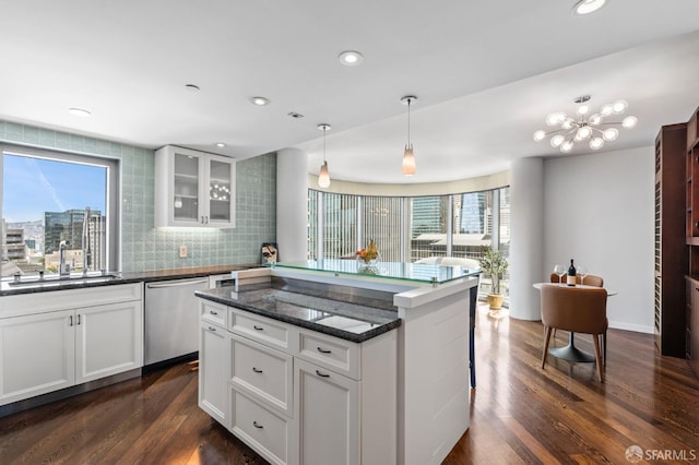 333 1st St Unit N1404, San Francisco, CA 94105 - kitchen featuring dishwasher, a sink, dark wood-style flooring, glass insert cabinets, and white cabinets