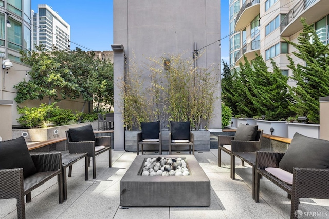 333 1st St Unit N1404, San Francisco, CA 94105 - view of patio with an outdoor living space with a fire pit