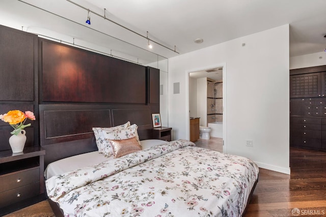 333 1st St Unit N1404, San Francisco, CA 94105 - bedroom featuring wood finished floors, baseboards, and ensuite bathroom